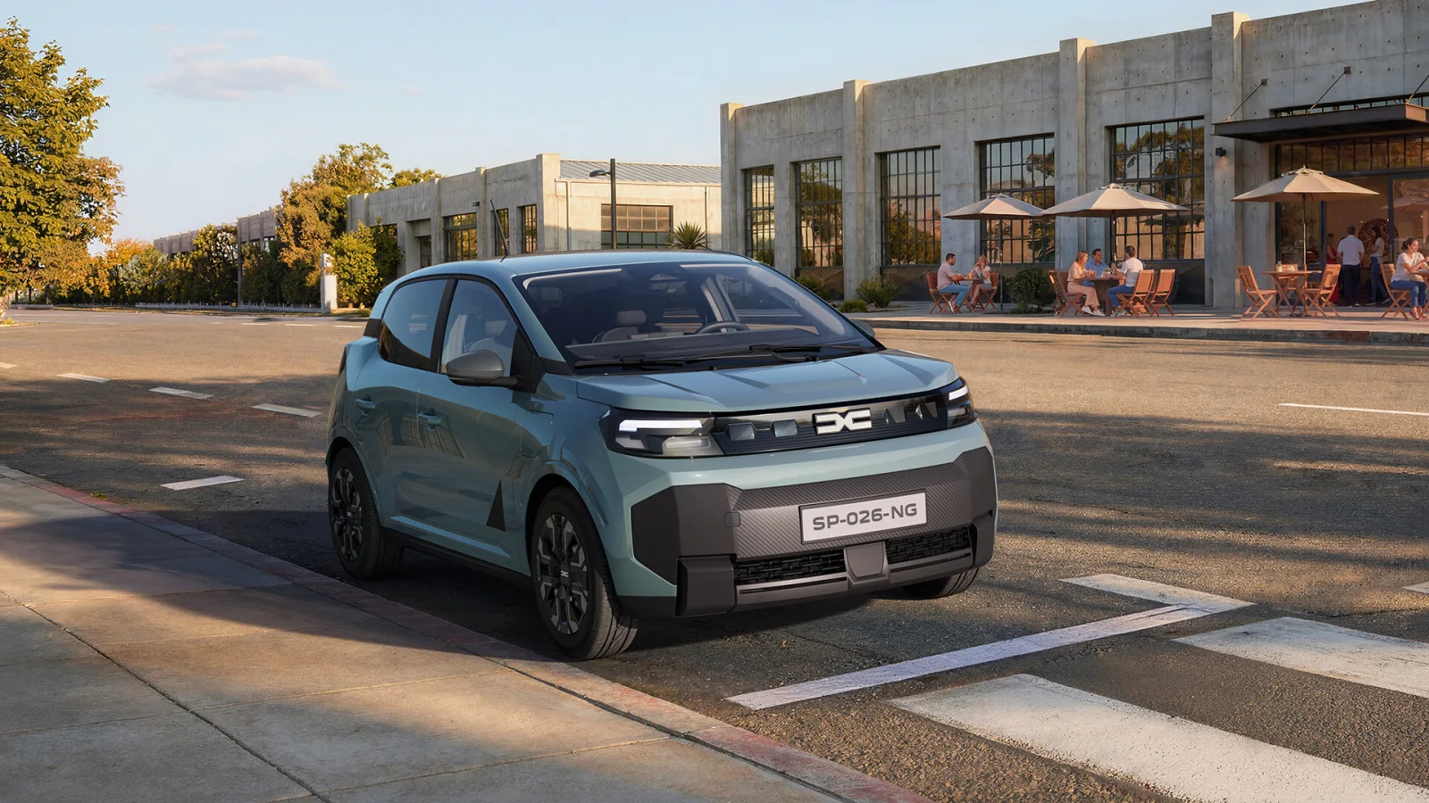 Nouvelle Dacia Spring électrique vert clair photographiée en ville